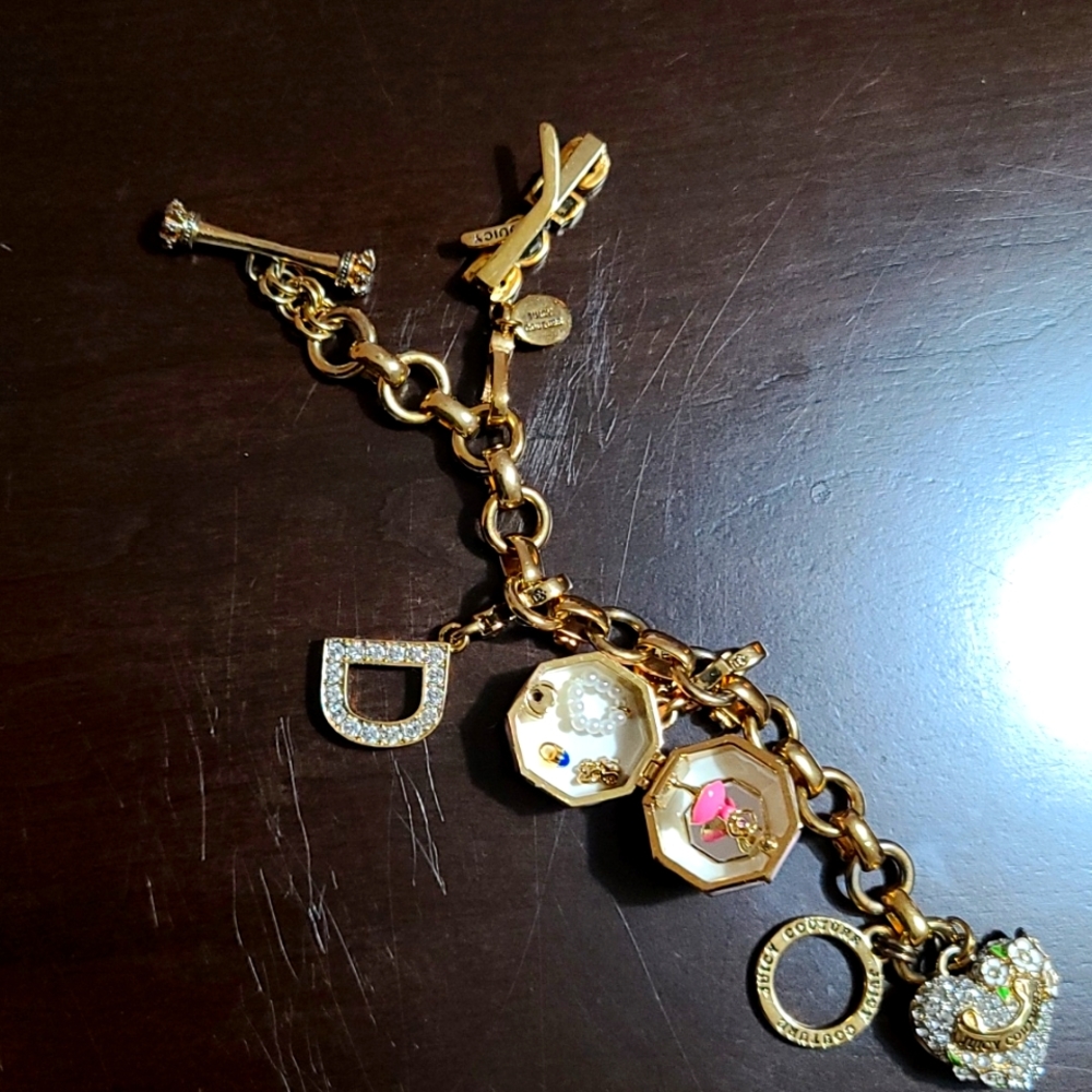 Juicey Couture   bracelet   with limited edition charms